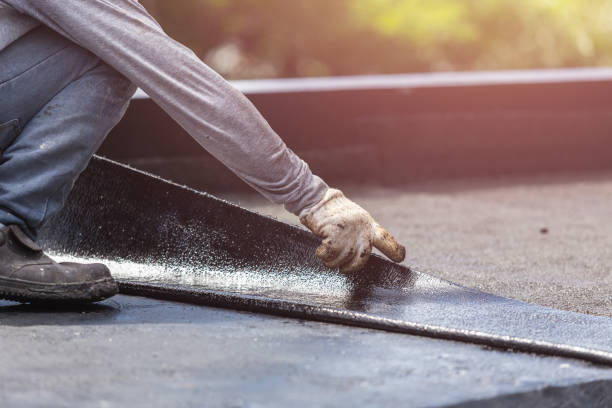 Professional Waterproofing technician working in Bedford, KY